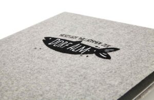 flat embroidery on loden menu