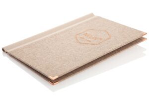 Menu made of loden in beige with clamp rail