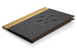Wooden menu in black with logo cutout