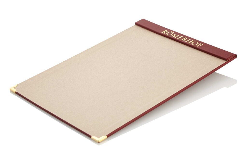 Menuboard from Medici in red and beige with integrated magnetic strip