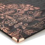 Menuboard back with metallic embossing in copper