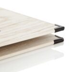 Wooden menu in white with black corners