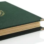 Menu made of green loden with old gold corners