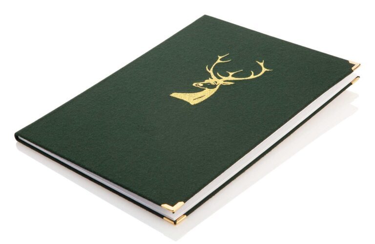 Menu made of green loden with passepartouts